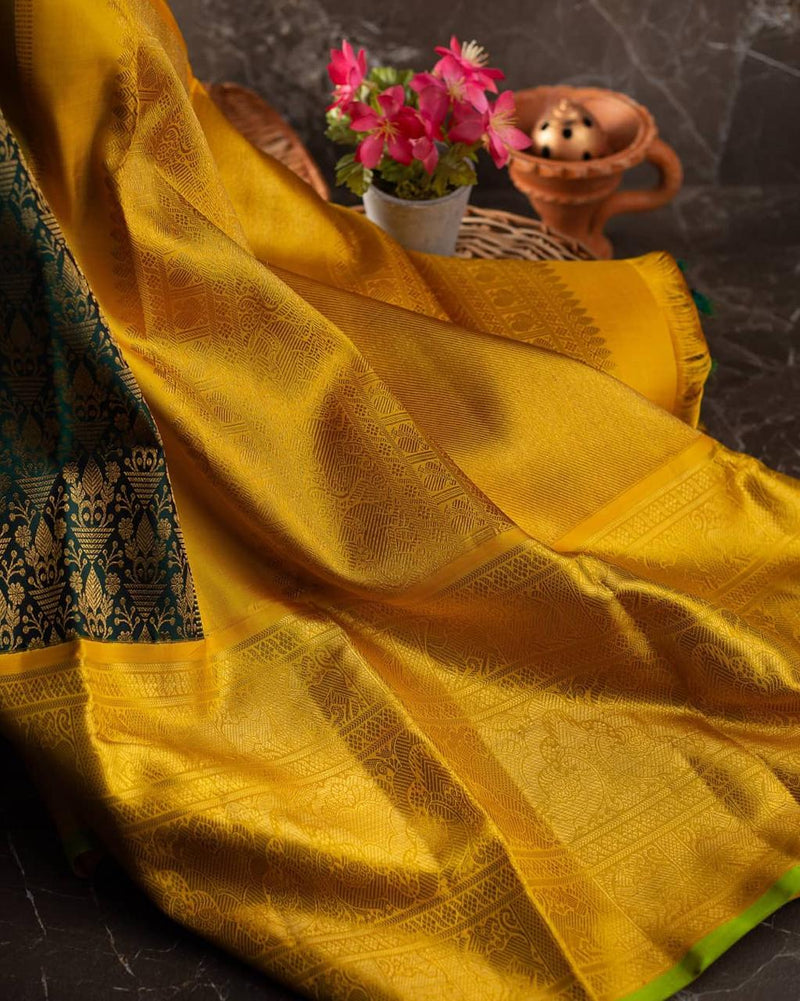 Valiba Kanchipuram silk saree has brocade of gold zari flower pots With edge and rich brocade Saree