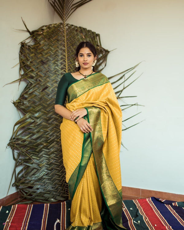 Yellow Kanchipuram Lichi Silk Saree .